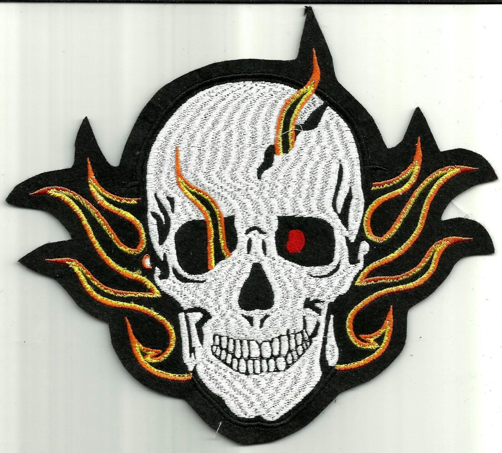 Sew On Patch of Small Red Eyed Flaming Skull Brand New Without Tags