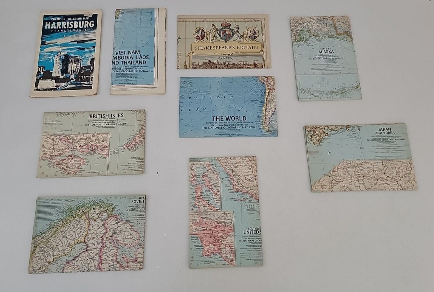 VINTAGE LOT OF 9 FOREIGN AND AMERICAN ROAD MAPS - THE WORLD , MAP VIETNAM ETC.