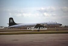 Aircraft Slide - Rich International DC-6A N61267 @ MIAMI 1978    (B117) picture