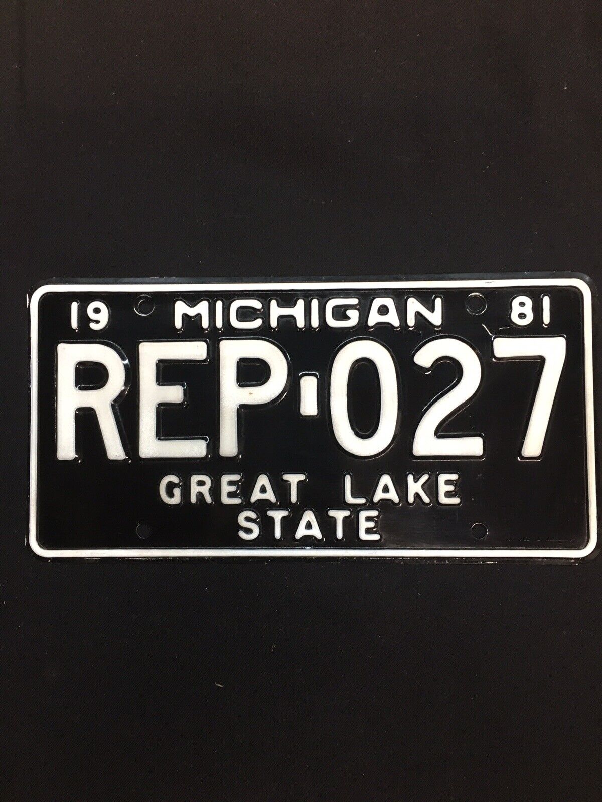 1981 Michigan black and white- Great Lake State￼ sample license plate REP 027