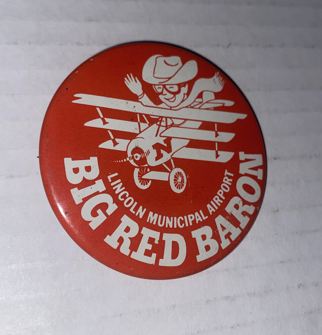 Vintage Big Red Baron Lincoln Municipal Airport Pin Back Button Airplane Promo