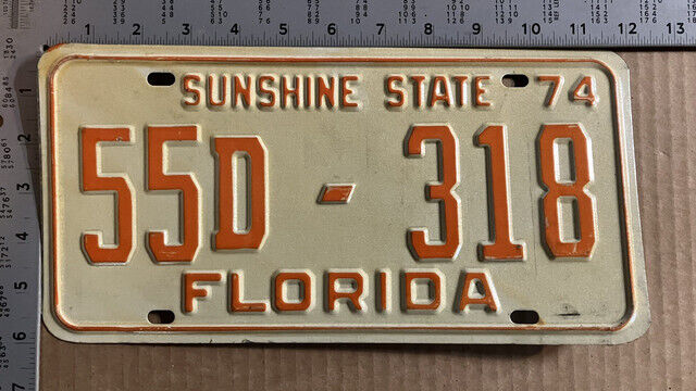 1974 Florida license plate 55D-318 YOM DMV tough GILCHRIST county 10581