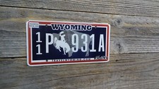 Wyoming Passenger with Hologram license plate with bucking horse Wyoming plate picture