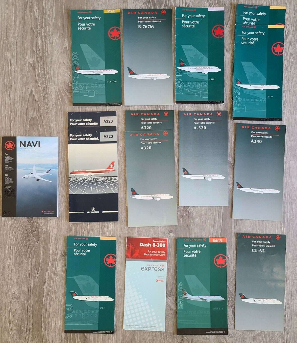 Lot of 15 Air Canada Safety Cards B767 A319 A320 A330 A340 CRJ Dash EMB CL-65