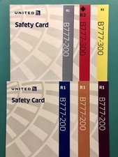 6 UNITED AIRLINES SAFETY CARDS—777-200,300 picture