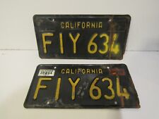 Vintage Black and Yellow California License Plates Pair FIY 634 DMV Clear Metal picture